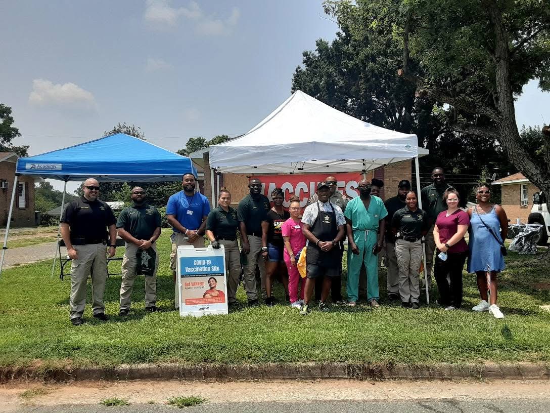 Community partners gathered at an outreach event